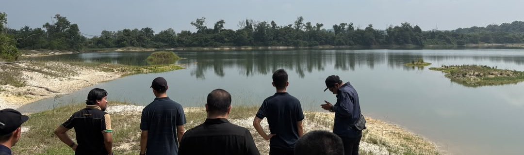The team at the edge of the lake site in Kuala Selangor